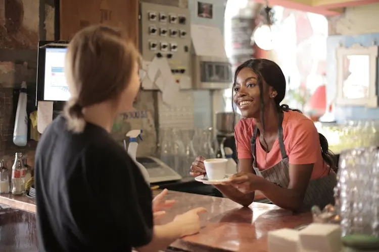 serving coffee at a coffee shop budget friendly dining